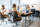 Group of diverse and creative colleagues working on computers in the modern office or coworking space, working on web design